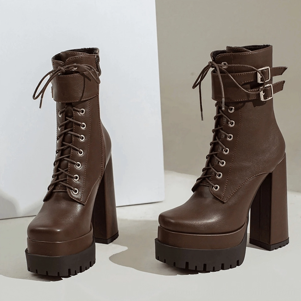 Gothic platform ankle boots showing square toe shape and metal buckle closure system