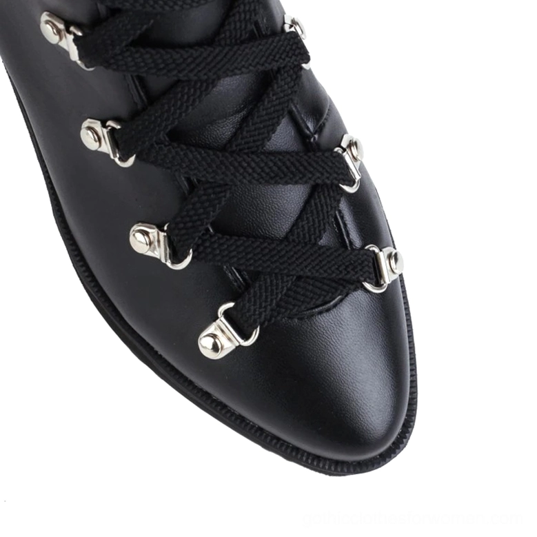 Gothic black platform boots toe area with crisscross lace-up and polished leather