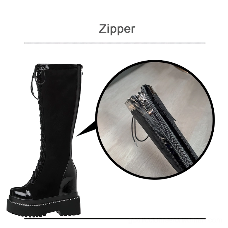 Black gothic platform boots close-up of side zipper closure system demonstrating functional design and patent leather accents