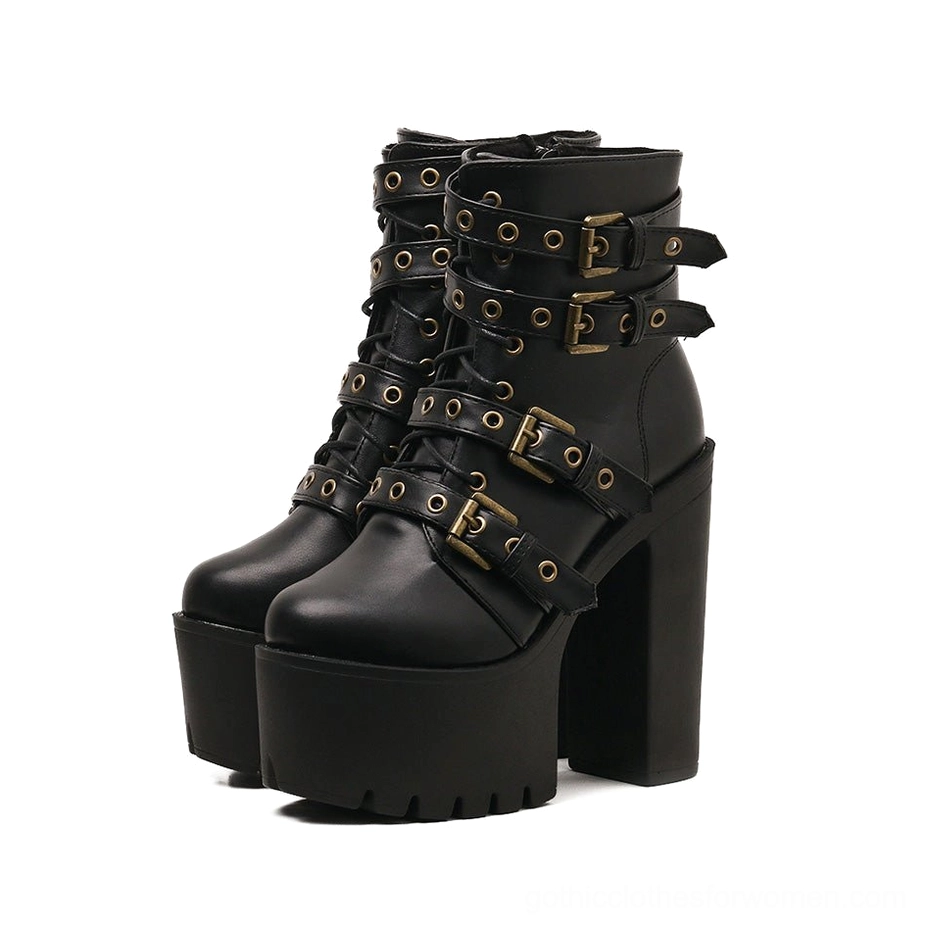 Black gothic platform buckle boots with chunky block heel and lace-up closure, front view showing metal rivets and multiple straps