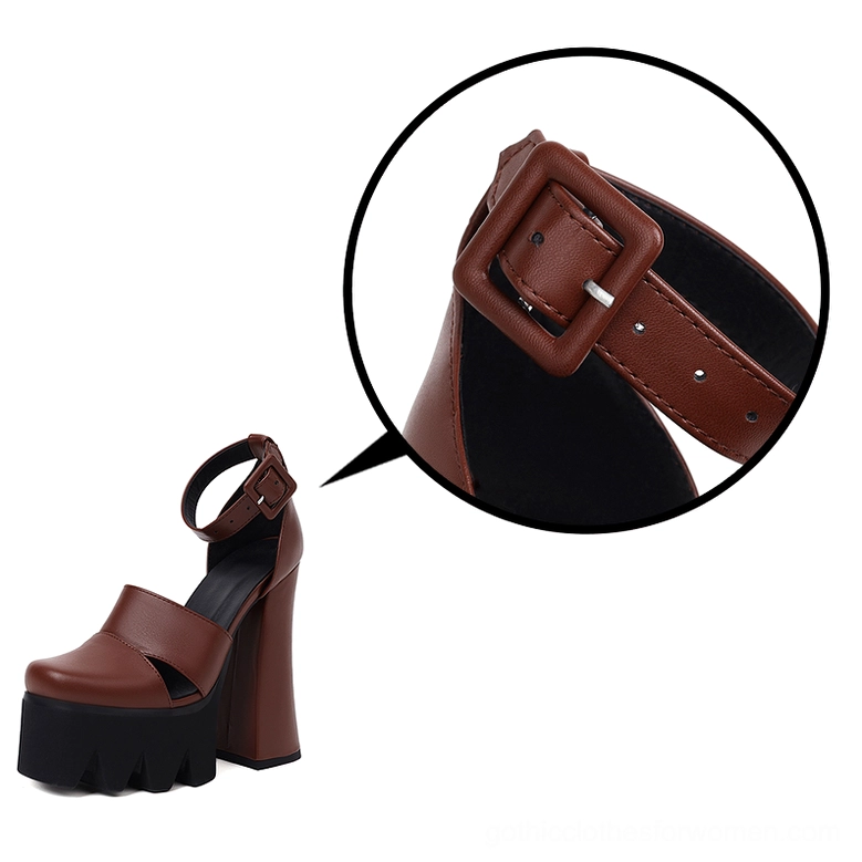 Close-up detail of brown gothic sandal showing adjustable buckle ankle strap and soft PU leather material