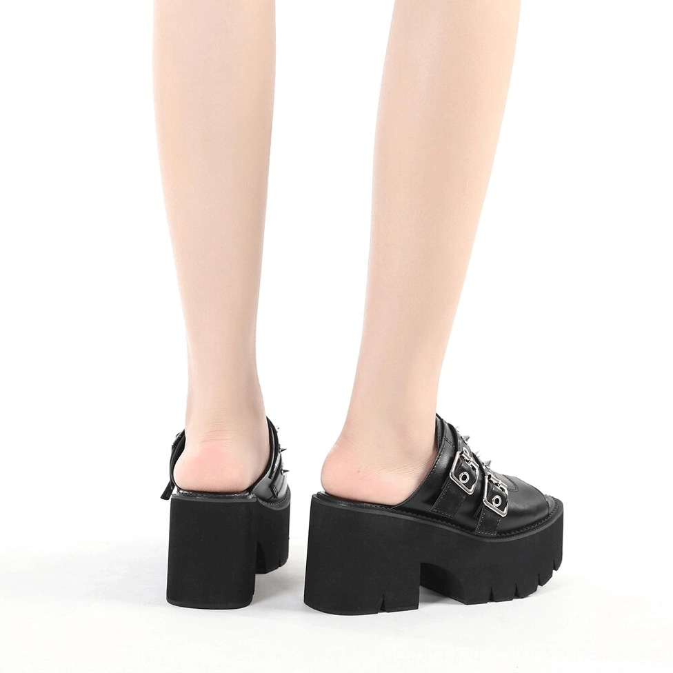 Black gothic spike platform sandal perforated eyelet strap closure system