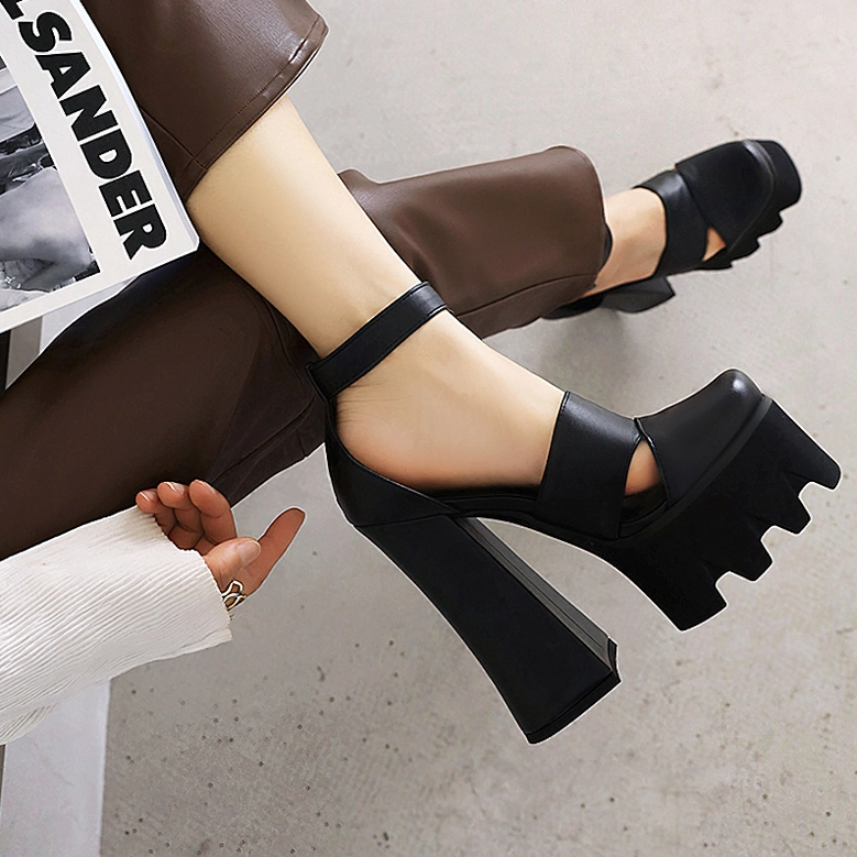 Gothic platform sandal highlighting premium PU leather construction and industrial-inspired architectural design