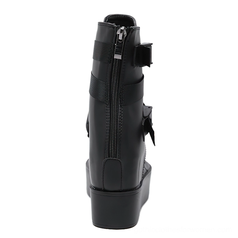 Black gothic platform sandal rear view showing functional rear zipper closure and side buckle hardware details with thick platform sole