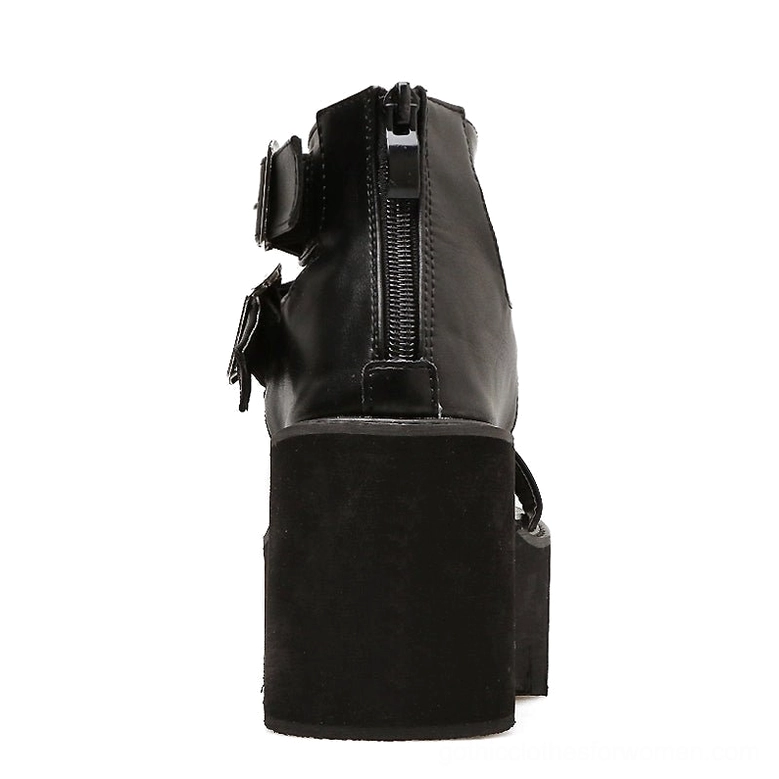 Black gothic platform sandals rear view showing back zipper closure and matte leather upper finish
