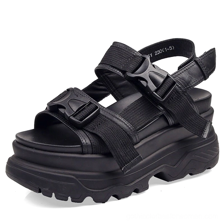 Black gothic platform sandals with adjustable buckle straps and chunky lug sole, top-front view