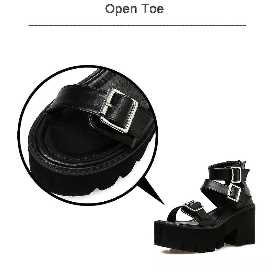 Black gothic platform sandals front view with detailed close-up inset of front metal buckle hardware and closure system