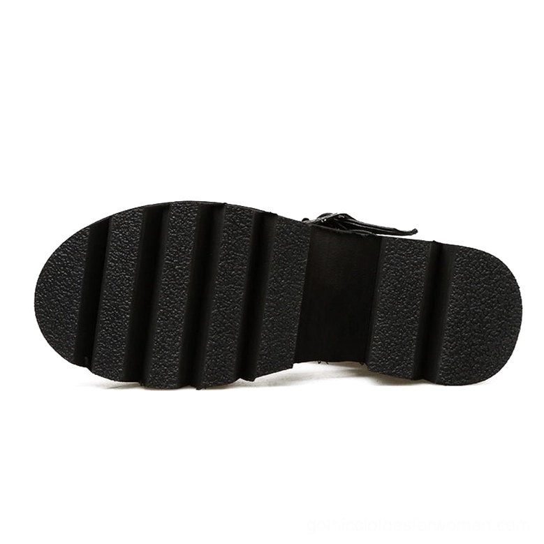 Black gothic platform sandal rubber outsole flat bottom view showing lugged anti-slip tread pattern