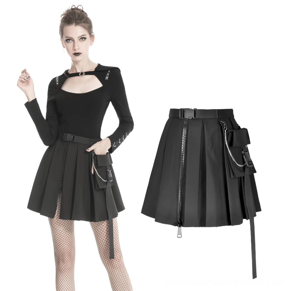 Black pleated gothic mini skirt on model with goth aesthetic wearing cutout top and chain pocket skirt