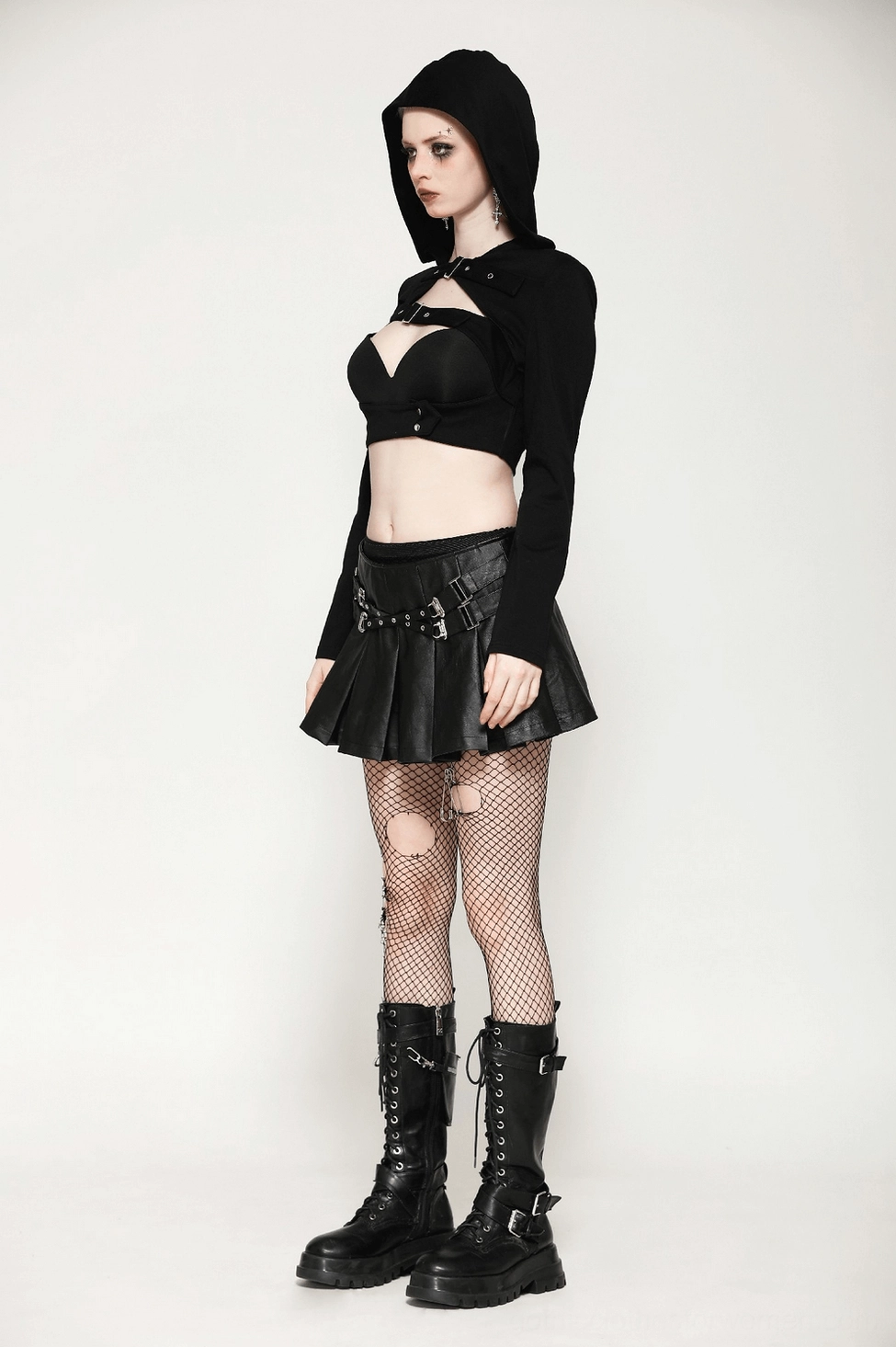 Pleated faux leather gothic mini skirt on model demonstrating fit and wearability in alternative fashion context