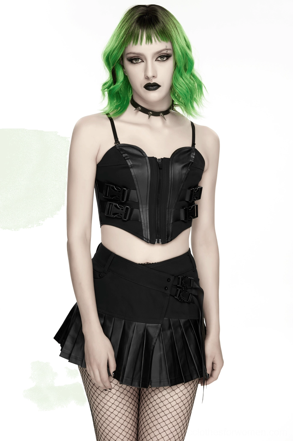 Model wearing black gothic pleated mini skirt styled with fishnet stockings and boots, showcasing the dramatic pleated silhouette and buckle hardware details