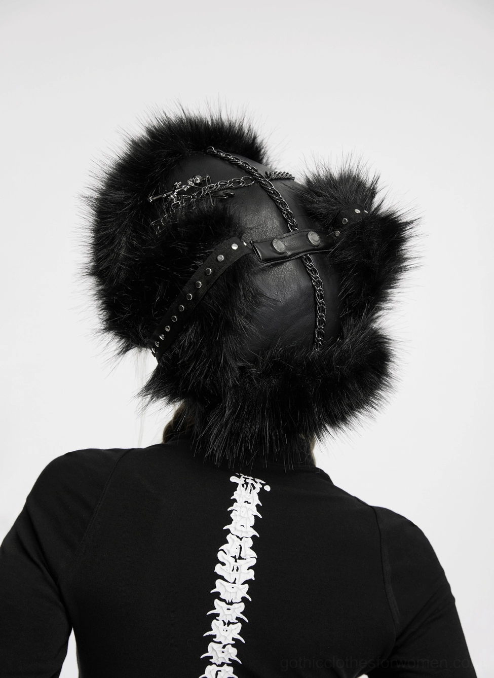 Side profile of black gothic plush trapper hat showing ear flap coverage and overall silhouette