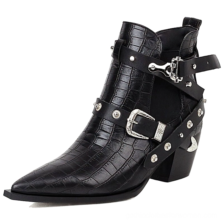 Gothic pointed toe ankle boots featuring square heel and metal rivet embellishments studio display