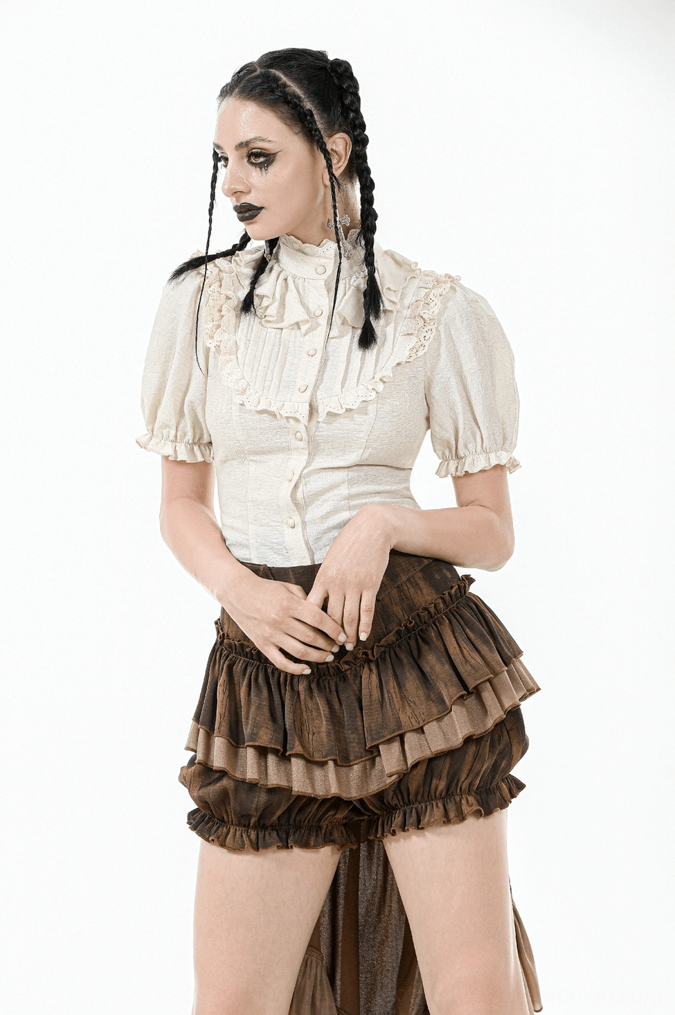 Beige gothic puff sleeve blouse emphasizing the romantic lace details and structured silhouette