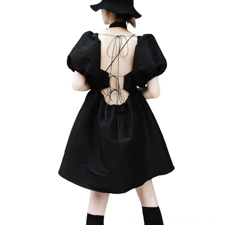 Black gothic puff sleeve mini dress with lace-up open back cutout, rear full-body view on model