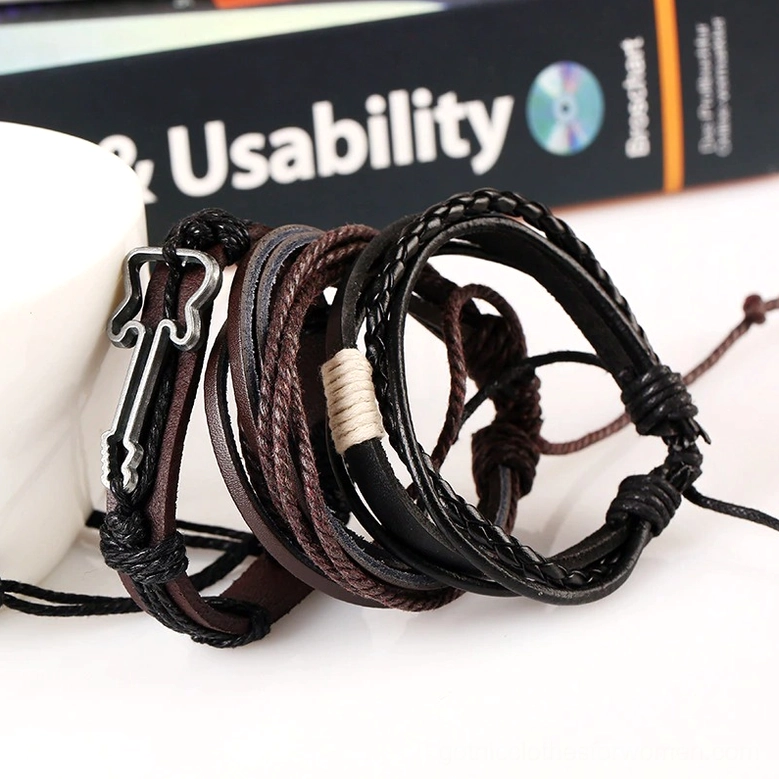 Punk gothic leather braided rope guitar charm bracelet lifestyle flat lay