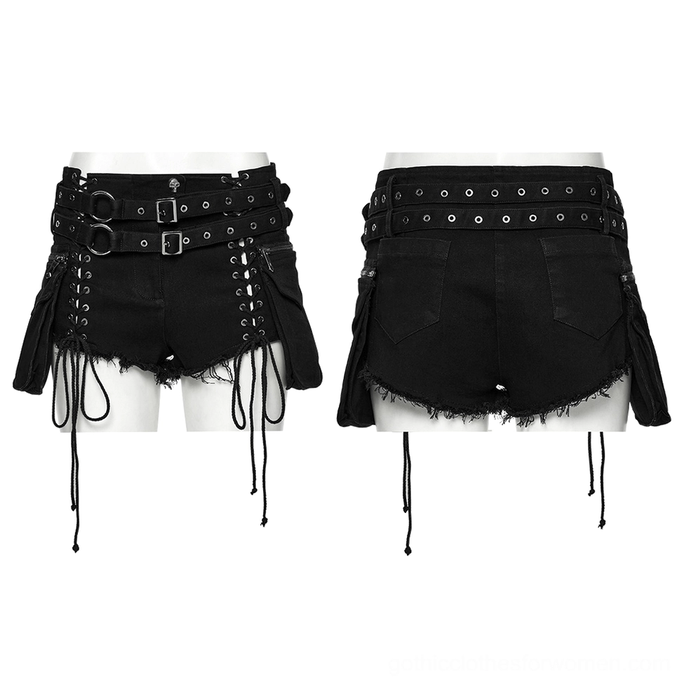 Front and back flat lay display of black punk shorts on mannequins showcasing double buckle belts, lace-up detailing, and detachable side pouches