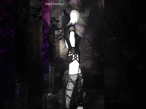 Gothic punk shorts set on mannequin side view with all-black studded garter accessories