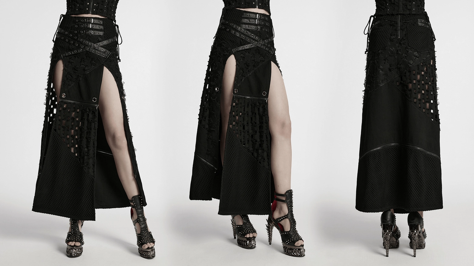 Black gothic punk skirt front detail highlighting mesh overlays and faux leather accent placement