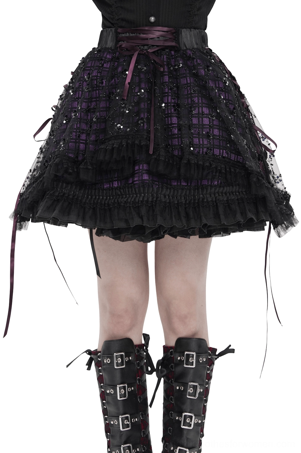 Gothic purple tulle skirt with black sequin mesh overlay and lace-up ribbon trim worn by model in front studio view, showing layered ruffled hem and corset-inspired waist details