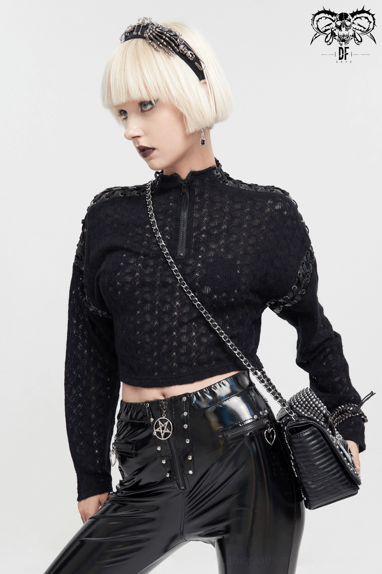 Model wearing black quilted gothic cropped top with studded crossbody bag - three-quarter front styling view