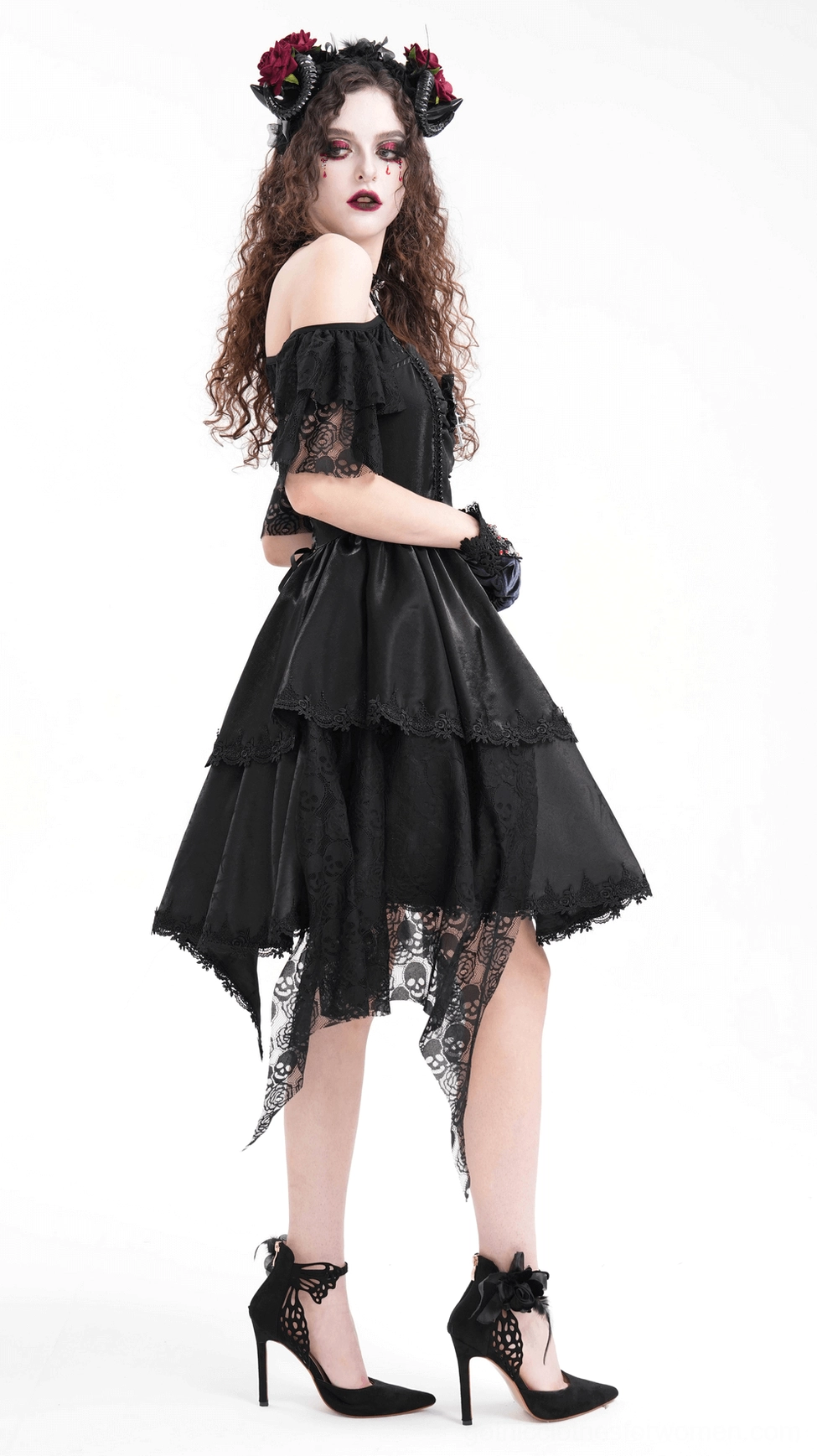Gothic horned rose headpiece styled for alternative fashion and gothic aesthetic with dramatic theatrical presentation and dark romantic composition