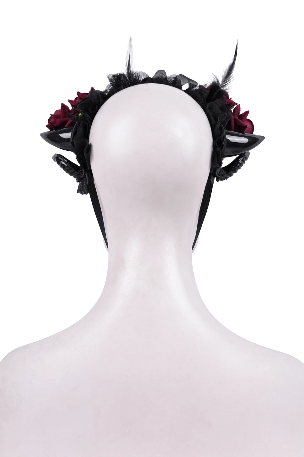 Rear view of gothic ram horn headpiece showing attachment straps, feather decorations, and base construction on bald white mannequin bust
