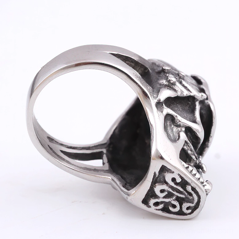 Side profile of stainless steel gothic ring band with filigree engraving and open design