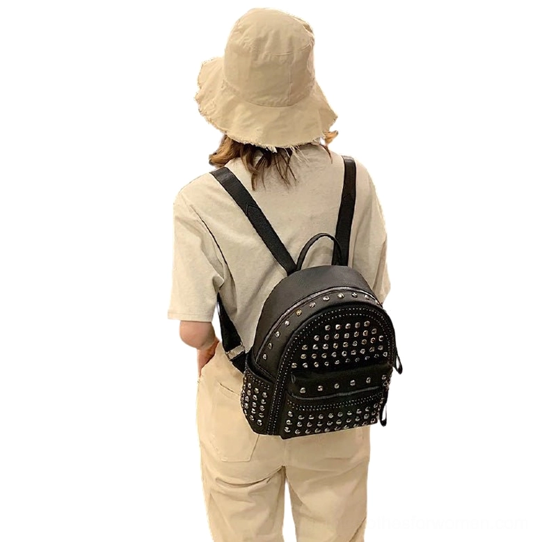 Full rear view of black gothic studded shoulder bag showing all-over rivet decoration and carrying comfort