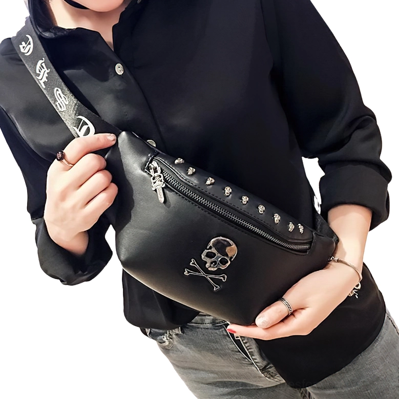 Styling example of gothic skull waist bag worn at chest level with studded zipper detail, paired with black shirt and denim