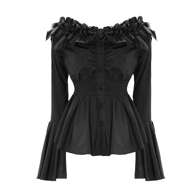 Flat lay of black gothic blouse showing off-shoulder design, rose-embellished neckline, button front placket, smocked waist, and flare cuffs