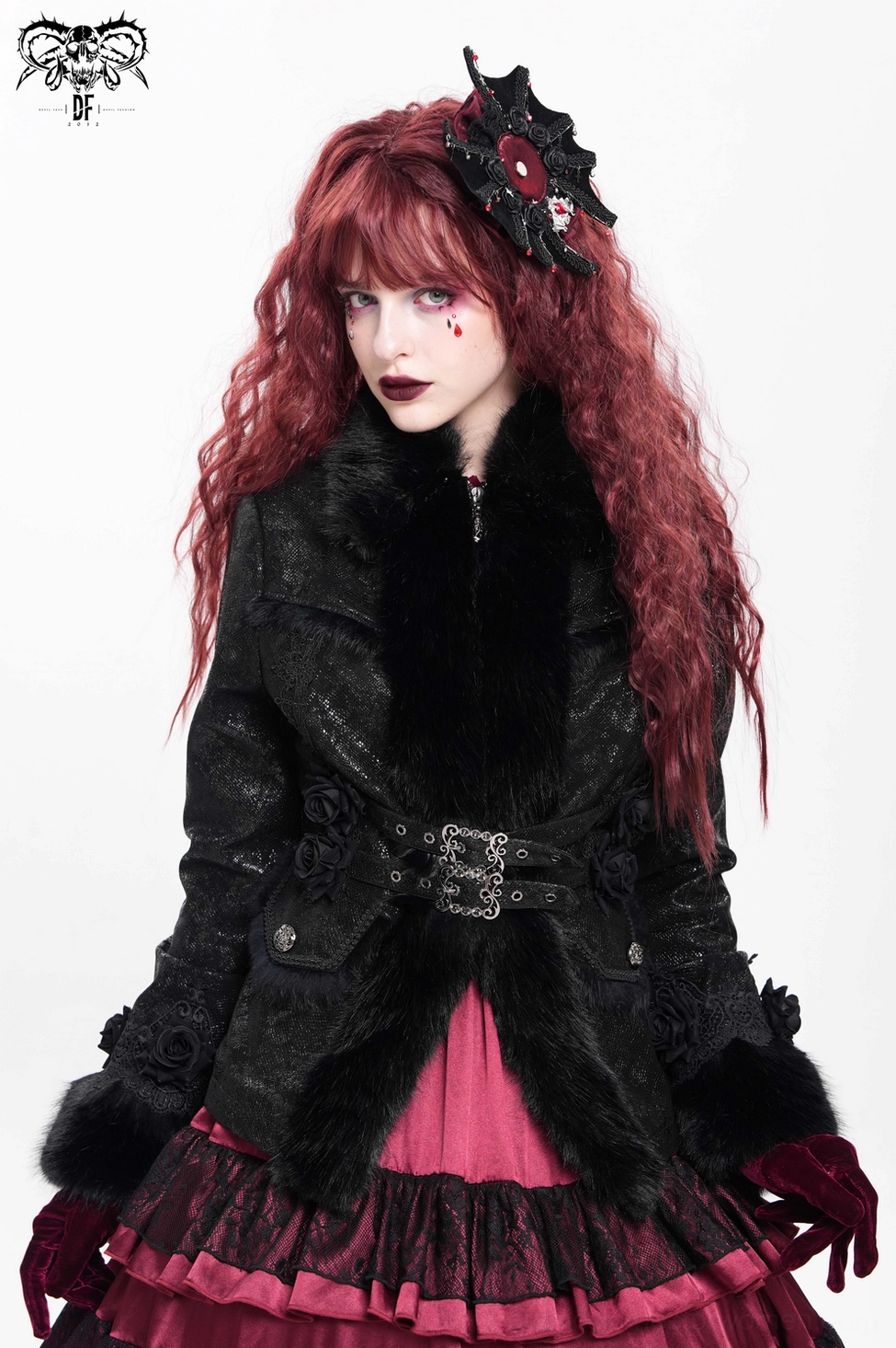 Vintage-inspired flat lay of gothic rose cross hair clip featuring layered construction, burgundy rhinestones, and intricate cross chain details