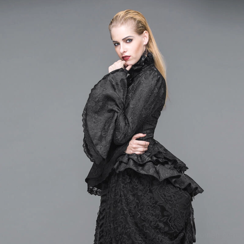 Black gothic ruffle blouse detail showcasing intricate lace patterns and architectural construction