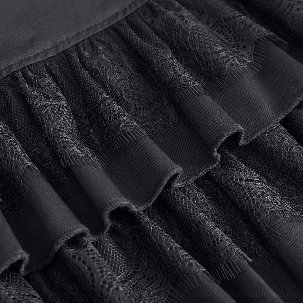 Black gothic ruffle skirt detail emphasizing the construction quality, snap buttons, and layered ruffle hem craftsmanship
