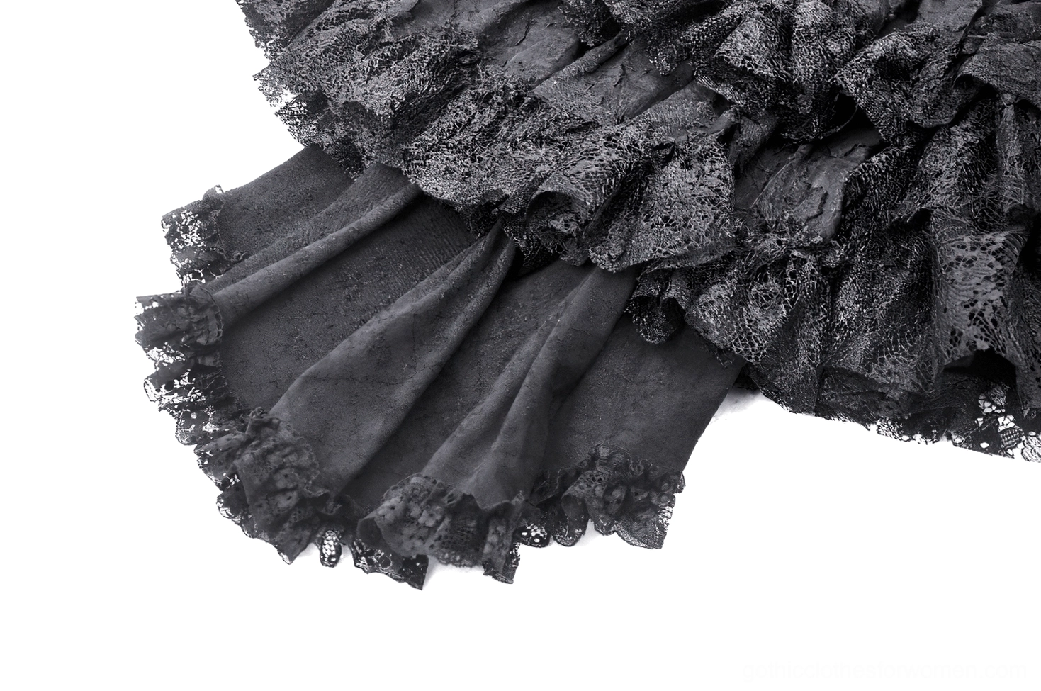 Black tiered ruffle gothic skirt hem close-up - double layered lace ruffles with asymmetrical cut