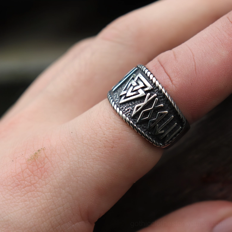 Stainless steel gothic rune ring with twisted rope design and Valknut Norse symbol, suitable for witchy occult and alternative fashion styling