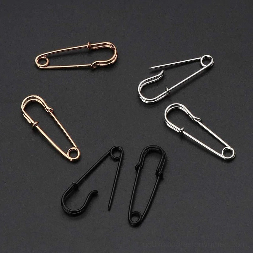 All three color variants of gothic safety pin cross ear studs - black, silver, gold punk rock jewelry collection