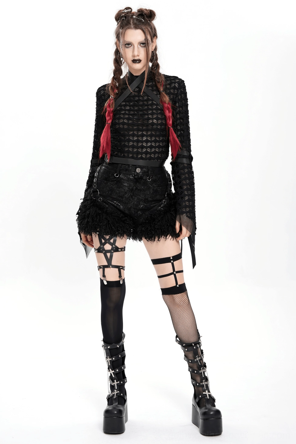 Alternative fashion styling inspiration with black gothic shorts paired with band merchandise and goth accessories