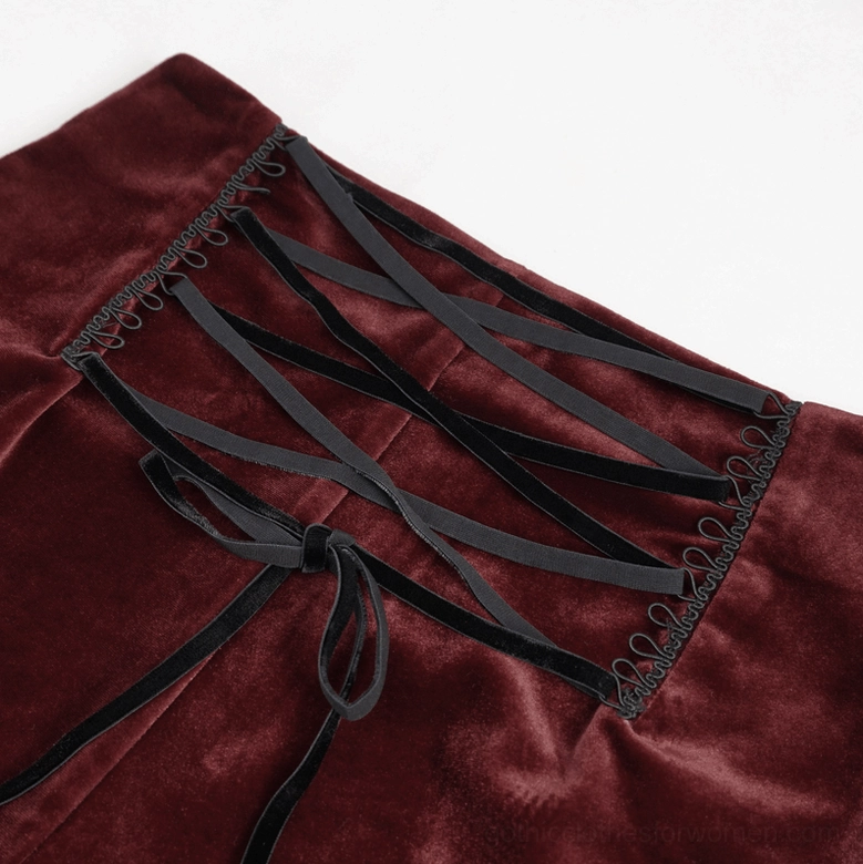 Back detail close-up of gothic shorts showing crisscross lace-up back design with decorative bow tie