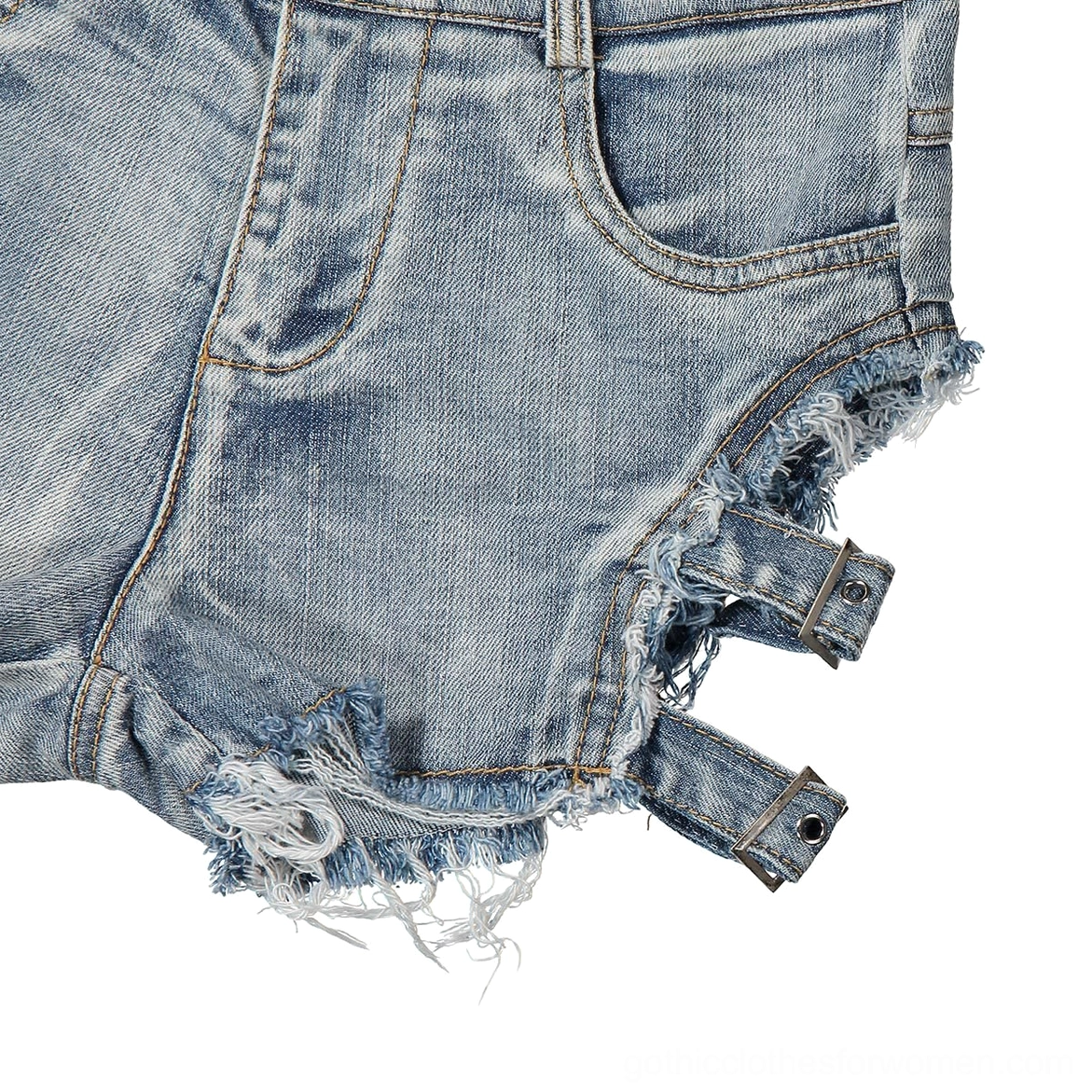 Alternative fashion model wearing gothic high-waist denim shorts with band tee and accessories