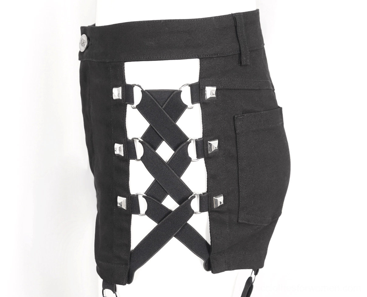 Close-up detail of black gothic shorts back lace-up construction with metal studs and hardware