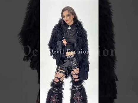 Full-body gothic outfit featuring black patent leather shorts with chains, paired with furry coat and ripped fishnet boots
