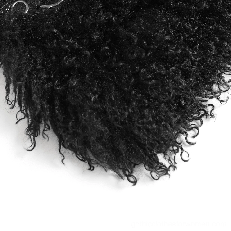 Close-up texture of jet black faux fur trim on gothic shorts showing dense curly wool-like pile and soft fluffy finish