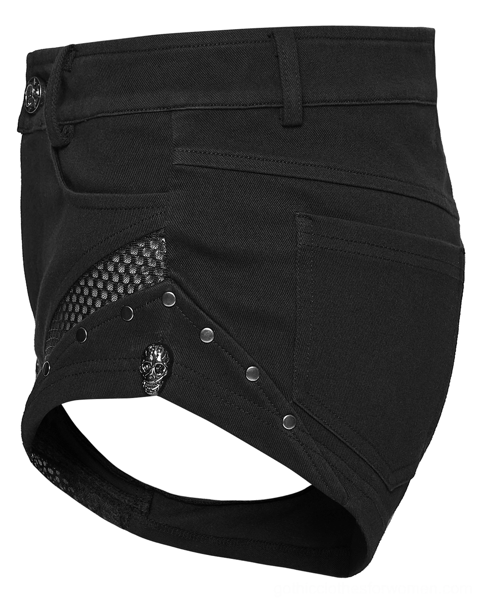 Punk shorts side panel detail view with cutout leg design, skull hardware, and mesh inset