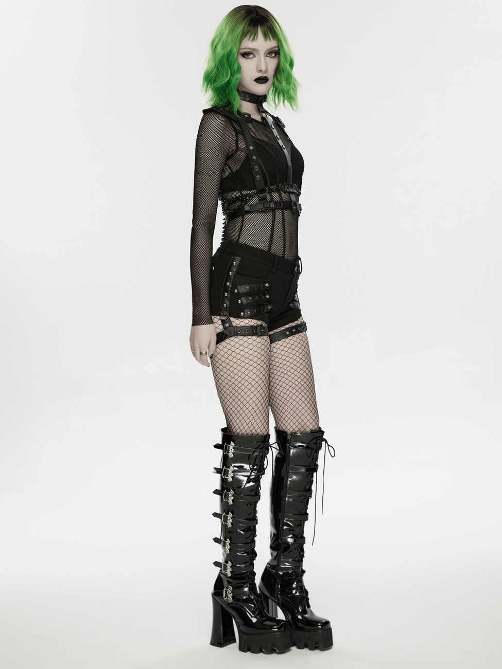 Black gothic shorts with adjustable leg straps styled on model, showcasing slim-fit silhouette and festival-ready aesthetic
