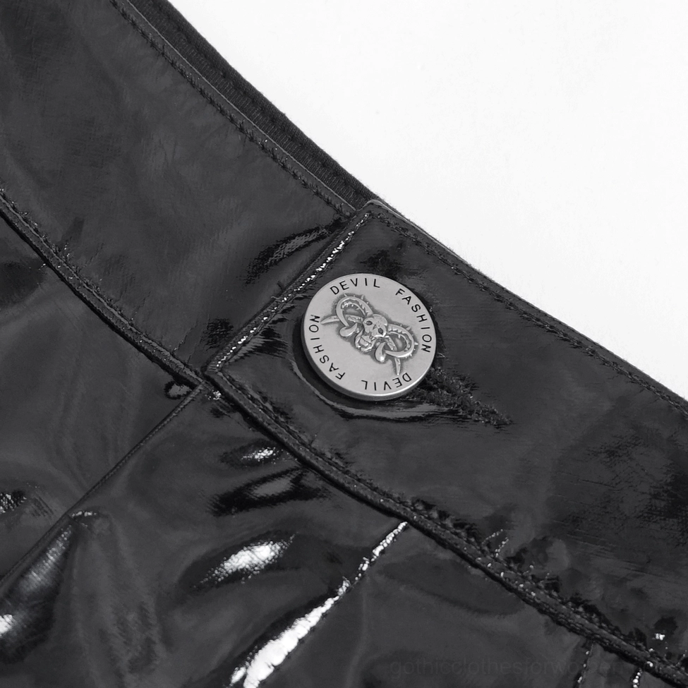 Shorts waistband close-up featuring metal button and glossy black patent leather fabric texture