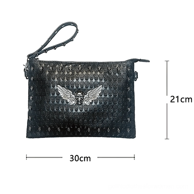 Black leather gothic handbag with studded details and metal skull ornament, sized reference view 30cm x 21cm