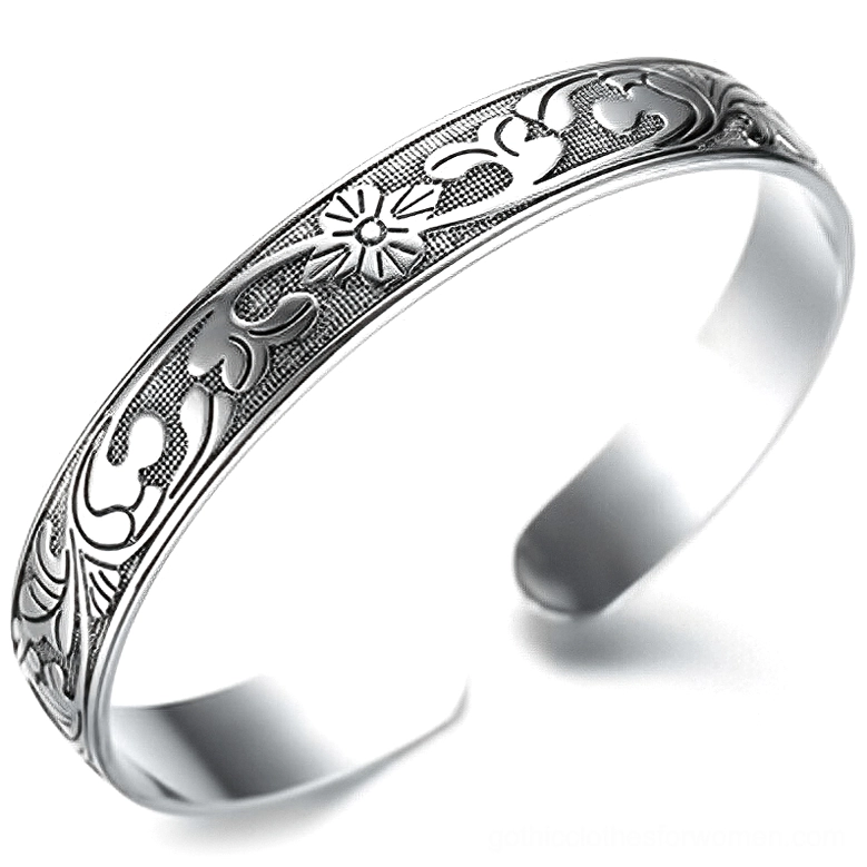 Gothic silver ethnic floral open cuff bracelet front view, vintage hand-engraved bangle with ornate flower patterns on white background
