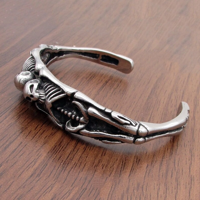 punk goth skeleton cuff bracelet three-quarter view with full skeletal embossed design