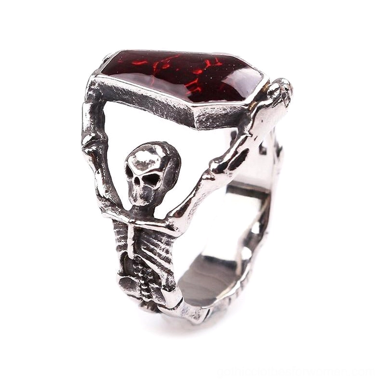 Alternative gothic skeleton ring side view displaying vintage silver tone finish and detailed skeletal artwork with red coffin-shaped stone